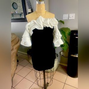 Brand new never worn. Classy dress for a nice event size medium